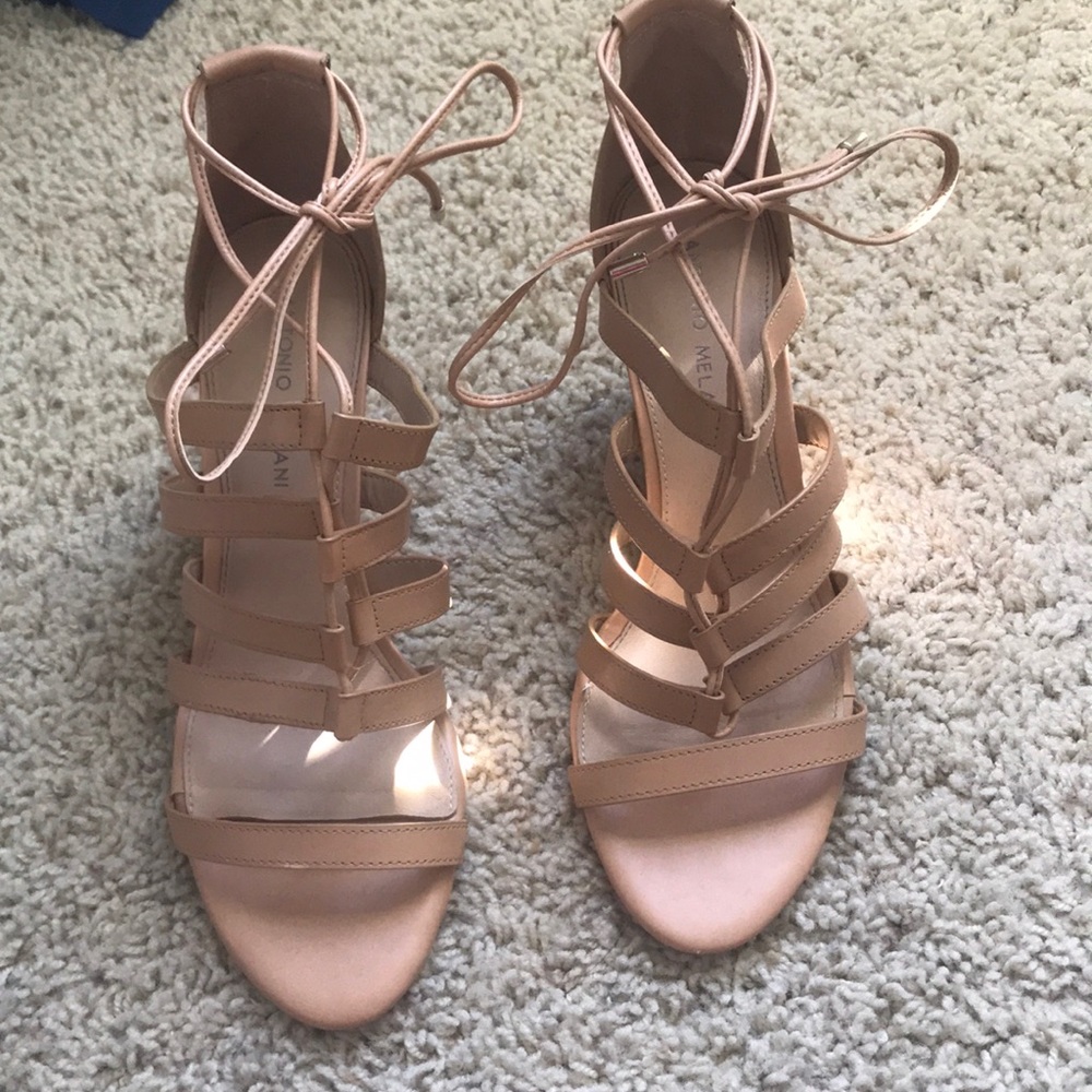Nude wedges that have been barely worn